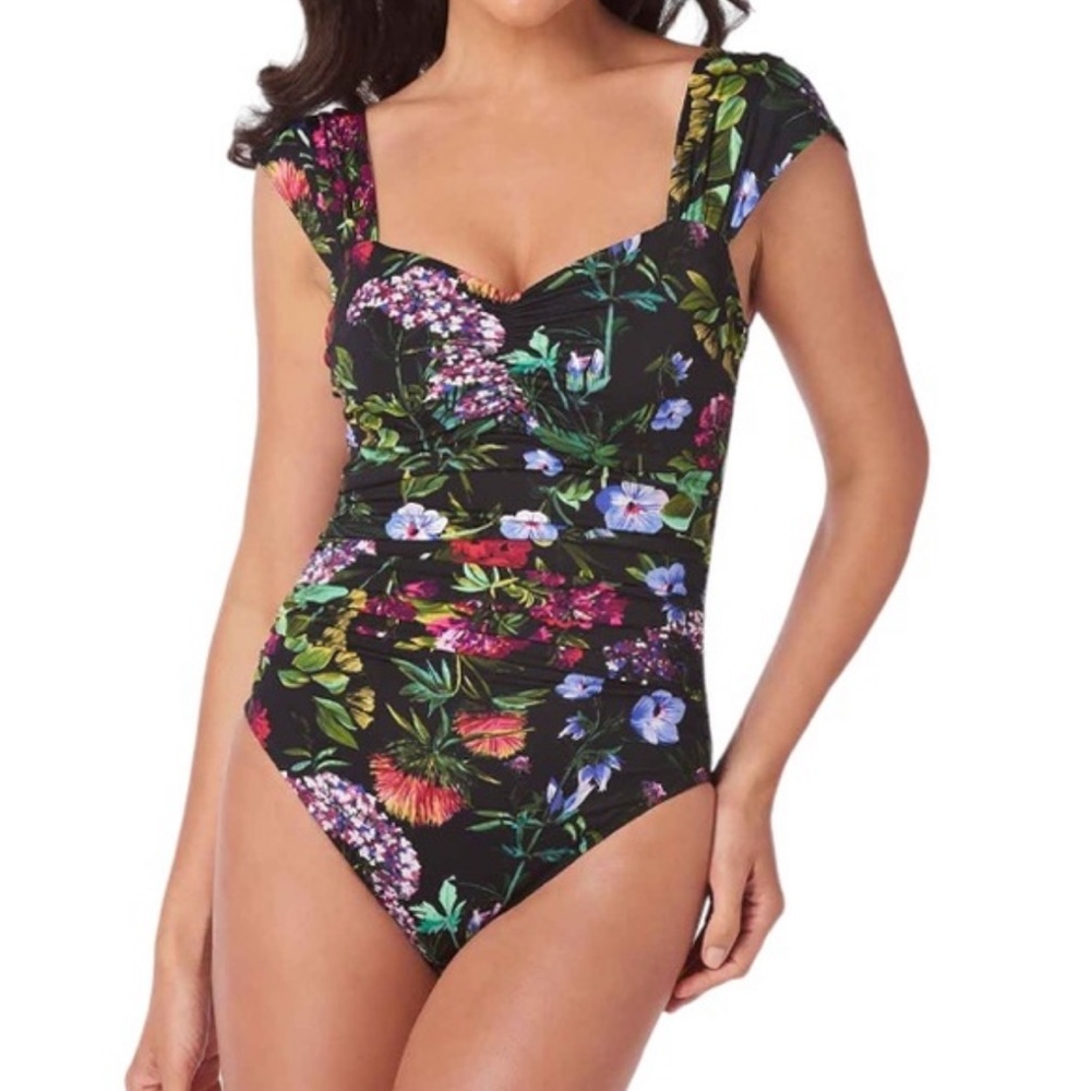 Miracle suit black floral suit new with tags.